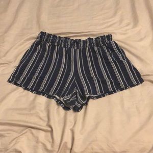 Navy blue with white stripes, elastic and with strings
